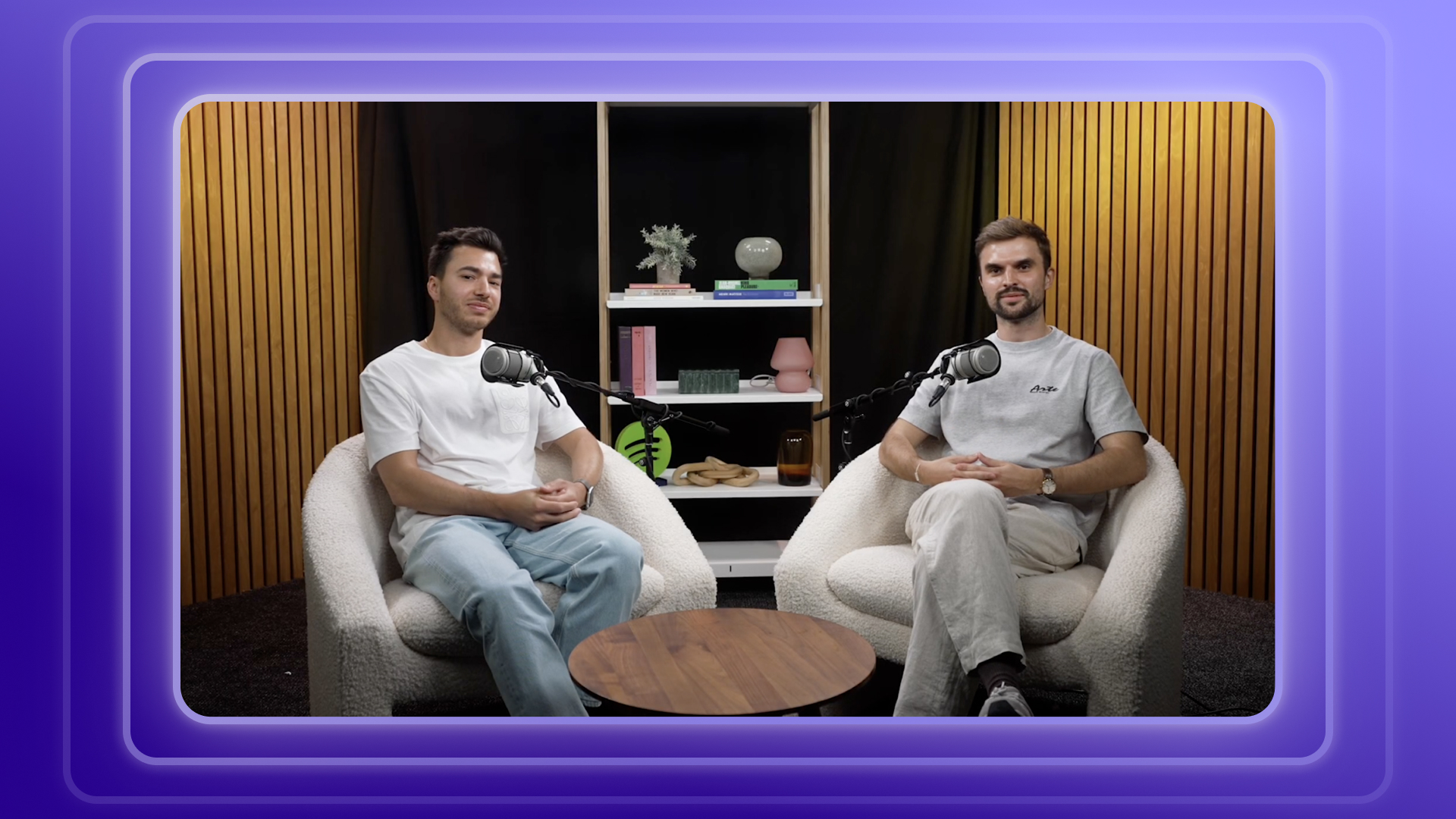 Two Motion Society co-founders seated with microphones in the Spotify interview studio.